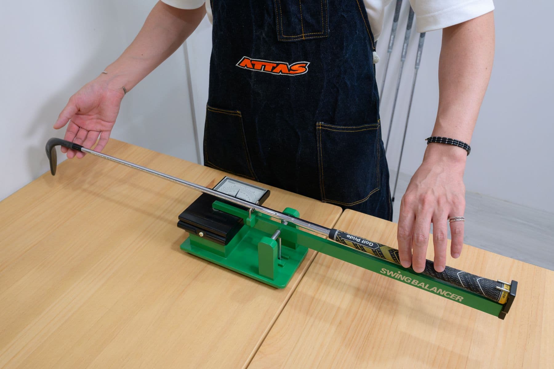 Measuring a club on the workbench